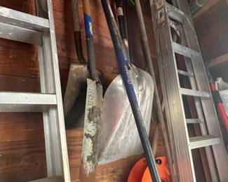 Lots of Ladders and Tools in Garage