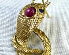 Single 14k Gold Serpent Figurine Earring 

Measures about 1.3 inches 