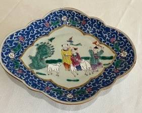 Vintage Footed Chinese Decorative Plate

Measures 10.5"x 9" x 2.5" 