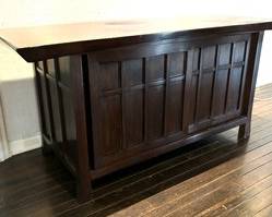 Vintage Mahogany Serving Cabinet 

Serving cabinet, possibly lauan mahogany, likely Asian manufacture. Features a rectangular top – torii gate style overhang, recessed paneled sliding door and sides housing interior drawers

Measures 30 inches high by 85 inches wide by 24 inches deep. 
