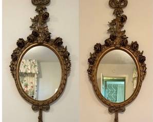 Pair of Beautiful Vintage Oval Wall Mirrors. Lovely painted wood adorned with roses and bows.  All of the little details make these large mirrors even more gorgeous! 

Each measures 47 inches tall.
