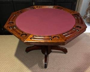 Awesome Vintage Hardwood Reversible Octagonal Form Game Table is perfect for when you are hosting game night!

Measures 30 inches tall and 52 inches in diameter. 