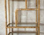 Vintage Milo Baughman-Style Etagère

Beautiful! This Magnificent Mid Century Shelf features a wicker wrapped frame paired with glass shelves.Great looking place to display your treasures! 

Measures 42 x 16 x 79 inches  