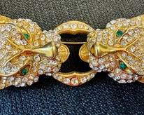 Vintage Rhinestone Gold Tone Tiger Brooch / Pin

Measures about 2.75 inches. 