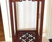 Vintage Asian Style / Plant Stand in a lovely design with carved details. Looks to be crafted in mahogany. 

Measures 12 x 12 x 32 inches.
