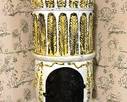 Glazed Terra Cotta Vintage Stove / Kachelofen 

Stove/ Kachelofen, glazed terra cotta with yellow and black paint. Neoclassical style, late 19th to early 20th century

Features a trophy finale over acanthus leaf and garland decoration

Measures 84 inches high by 22 inches wide by 21 inches deep
