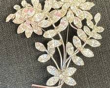 Vintage Rhinestone Floral Brooch 

Sparkly and gorgeous! Measures about 3.5" x 3" 