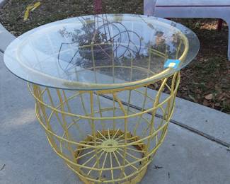 Metal accent table with glass top