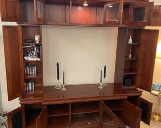 Cherry Wall Unit / Entertainment Center  $450.00               12 Cabinet doors with light           76"w 20"d 81.5"t     Center Opening: 50"w 40"t Hold a 55"-60" TV