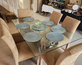 Stunning contemporary glass-top dining set w/ beautiful, sculptured pedestal and 6 parsons chairs!