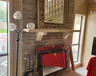 Dramatic sculptured - frame beveled mirror in driftwood / shell theme and an iron frame mirror. 