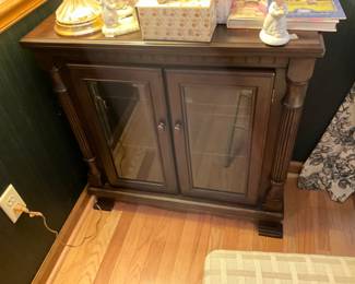 Small Cabinet with 2 glass doors n- shelves inside