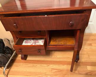 Drawers open on vintage wash stand