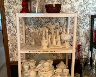 Lots of milk glass items including bud vases, snack set of 31npidces, cream & sugar, creamer with platter, candy with lid, smaller candy dish in front - various milk glass manufacturers 