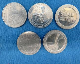 Lot 233. Five old casino tokens.&nbsp; Many are from closed casinos.