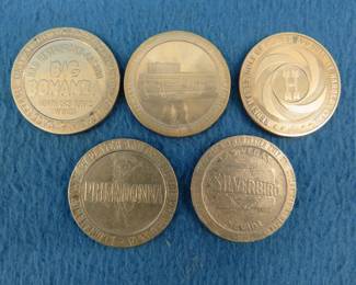 Lot 230. Five old casino tokens.&nbsp; Many are from closed casinos.