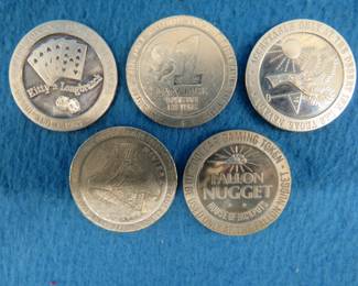 Lot 232. Five old casino tokens.&nbsp; Many are from closed casinos.
