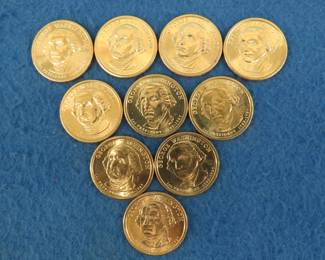 Lot 133. Ten gold-colored George Washington $1.00 Presidential coins