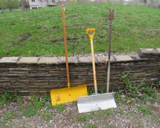 Lot 204. Two snow shovels and an ice chisel