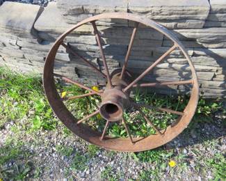 Lot 273. Antique 28" iron wagon wheel