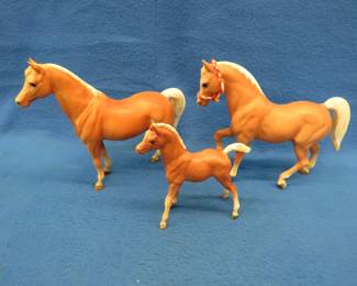 Lot 135. Plastic molded horse family in very good condition