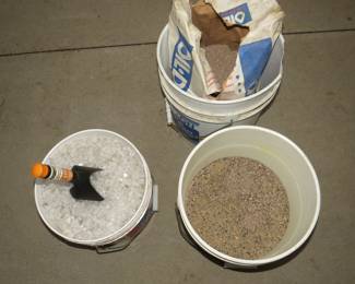 Lot 229. Salt, sand, and absorbent