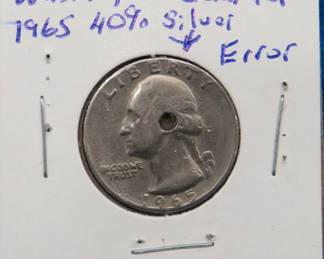 Lot 308. 1965 Washington quarter 40% silver error coin with damage