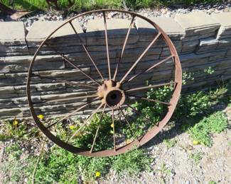 Lot 271. Antique 36" iron wagon wheel