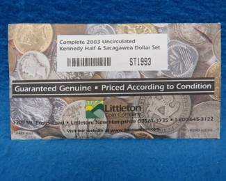 Lot 309. 2003 uncirculated Kennedy Half and Sacagawea Dollar coin set.&nbsp; Four coins.