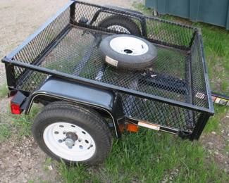 Lot 15. 2010  Utility Landscape Carry-On trailer with spare tire