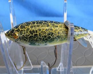 Lot 29. Vintage wooden Heddon 3 1/8" reverse running 1900 Baby Crab in green crackleback color with glass eyes
