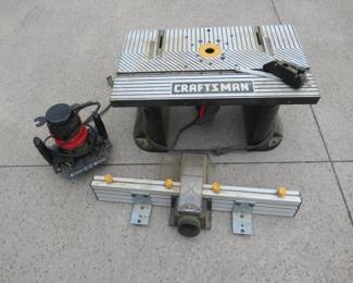 Lot 209. Craftsman router table and a Craftsman 1 1/8-HP router table