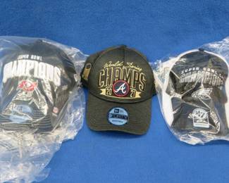 Lot 96. Four sports Championship hats