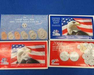 Lot 58. Four U.S. Mint coin sets