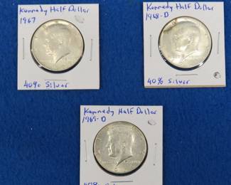 Lot 56. Three 40% silver Kennedy half dollars