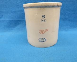 Lot 313. Two-gallon small wing Red Wing crock with a hairline crack