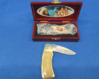 Lot 91. WWII and Native American-themed folding knives