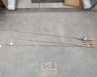 Lot 235. Three vintage metal fishing rods and one reel