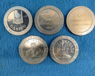 Lot 231. Five old casino tokens.&nbsp; Many are from closed casinos.