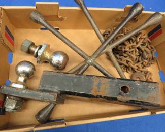 Lot 362. Hitches, tow balls, and a chain