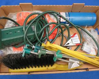 Lot 298. Mostly full propane bottle, tents stakes, and more