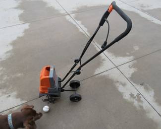 Lot 336. Remington Garden Wizard electric cultivator. Has compression. Just kidding. Works fine.
