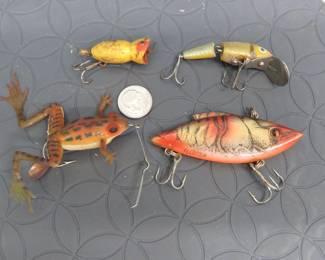 Lot 66. Four vintage lures.: