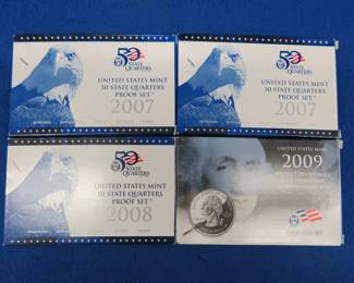 Lot 50. Four U.S. Mint quarter sets
