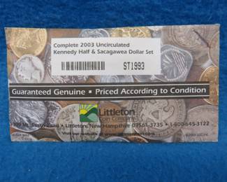 Lot 343. 2003 uncirculated Kennedy Half and Sacagawea Dollar coin set.&nbsp; Four coins total.