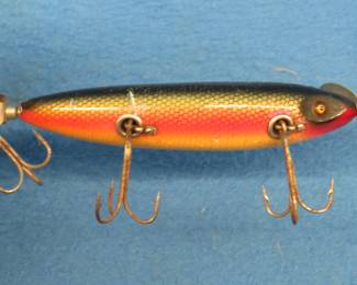 Lot 20. Vintage wooden Heddon 4 1/2" 170 SOS (Swims on Side) in dice color with glass eyes in VGC