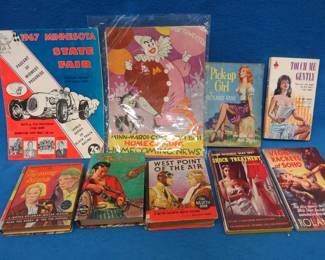Lot 44. Collectible ephemera including 1950s soft-core paperbacks, 1967 State Fair race program, and more
