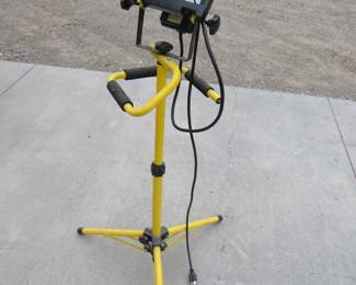 Lot 196. Adjustable height work light. Works