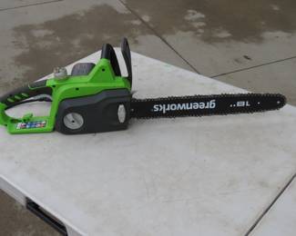 Lot 338. Greenworks 18" electric 4.5 A chain saw. Works.