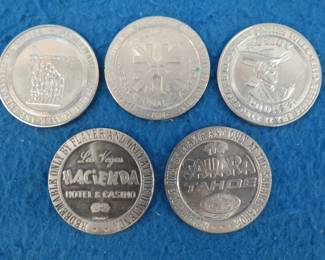 Lot 121. Five old casino tokens.&nbsp; Many are from closed casinos.